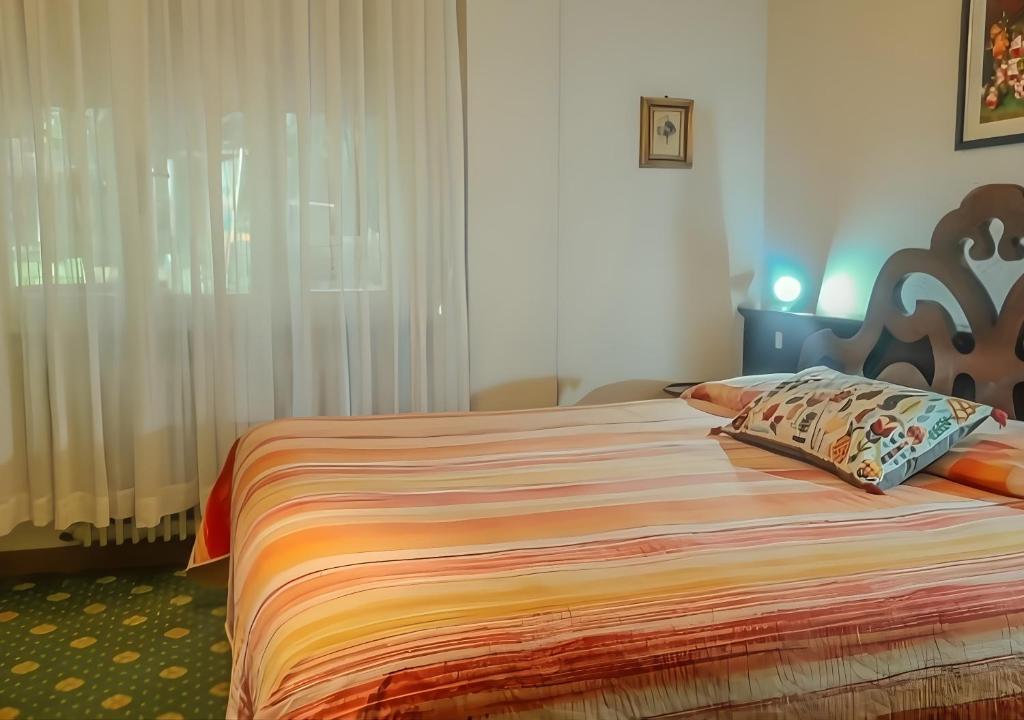 Postel nebo postele na pokoji v ubytování Bridge Hotel