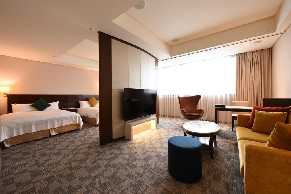 Postel nebo postele na pokoji v ubytování Via Hotel Breeze