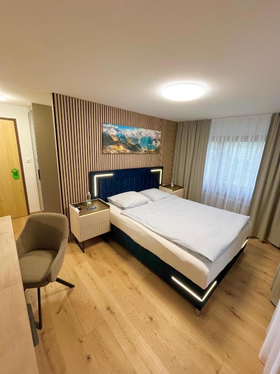 Postel nebo postele na pokoji v ubytování Seiler's Hotel