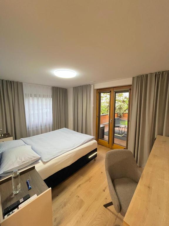Postel nebo postele na pokoji v ubytování Seiler's Hotel