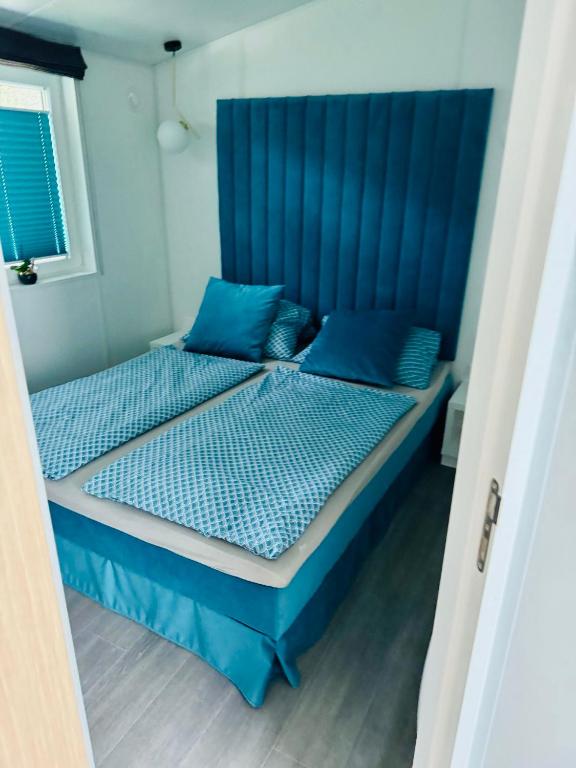 Postel nebo postele na pokoji v ubytování Waldcamping Brombach