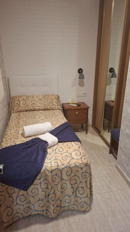 Postel nebo postele na pokoji v ubytování Hotel Sancho