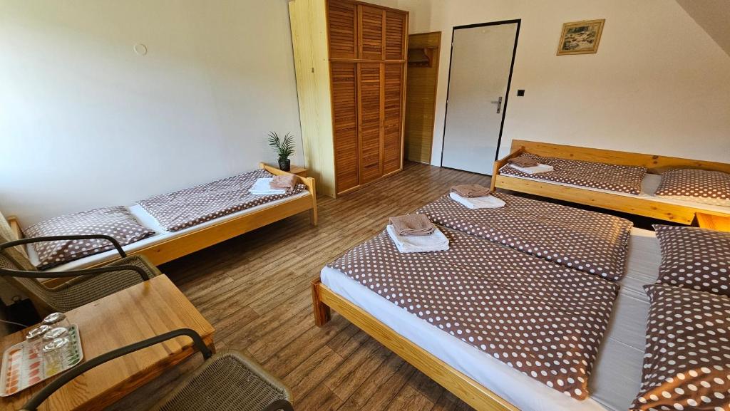 Postel nebo postele na pokoji v ubytování Baurů Dvůr