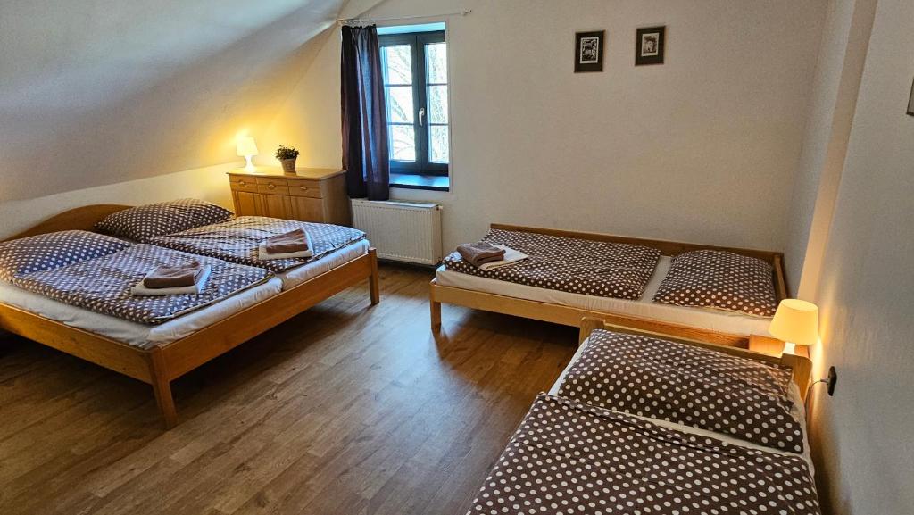 Postel nebo postele na pokoji v ubytování Baurů Dvůr