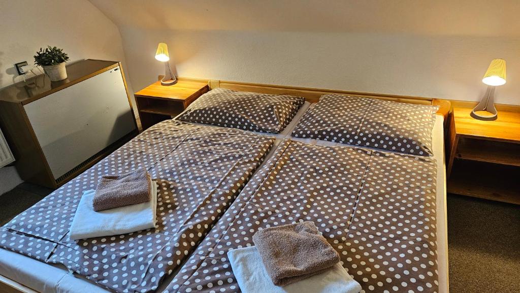 Postel nebo postele na pokoji v ubytování Baurů Dvůr