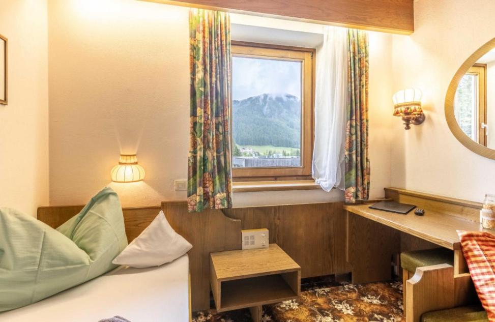 Postel nebo postele na pokoji v ubytování Hotel Elisabeth