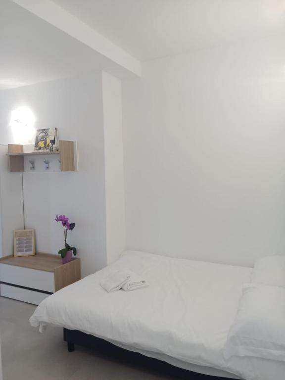 Postel nebo postele na pokoji v ubytování DandT HOME