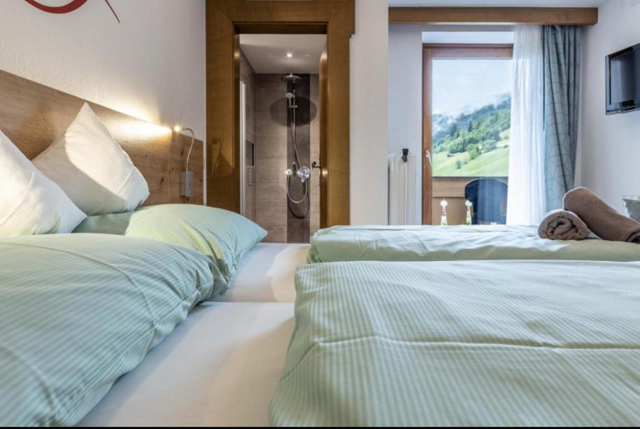 Postel nebo postele na pokoji v ubytování Hotel Elisabeth