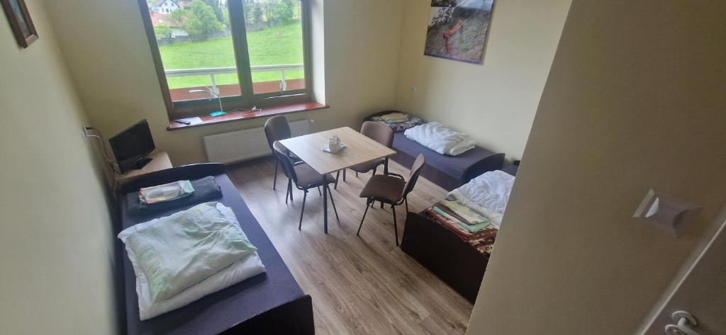 Posteľ alebo postele v izbe v ubytovaní Goprówka