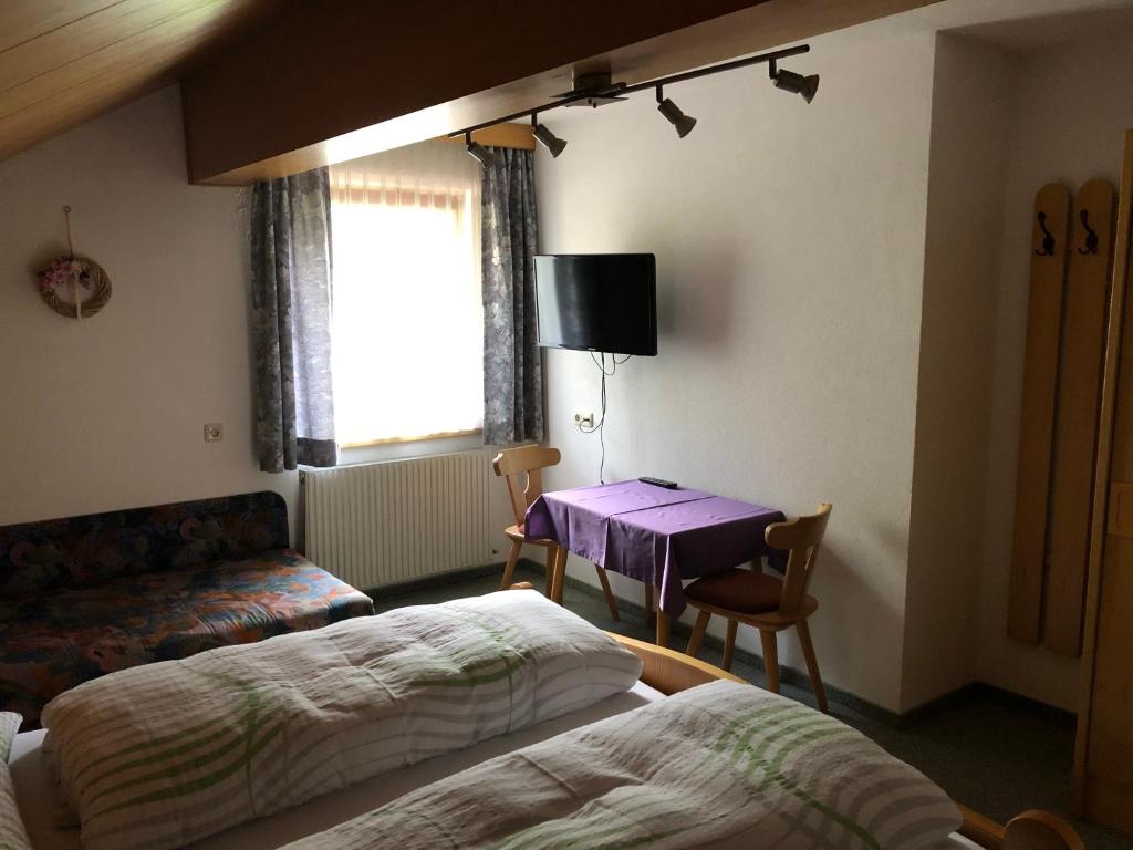 Postel nebo postele na pokoji v ubytování Villa Ilse