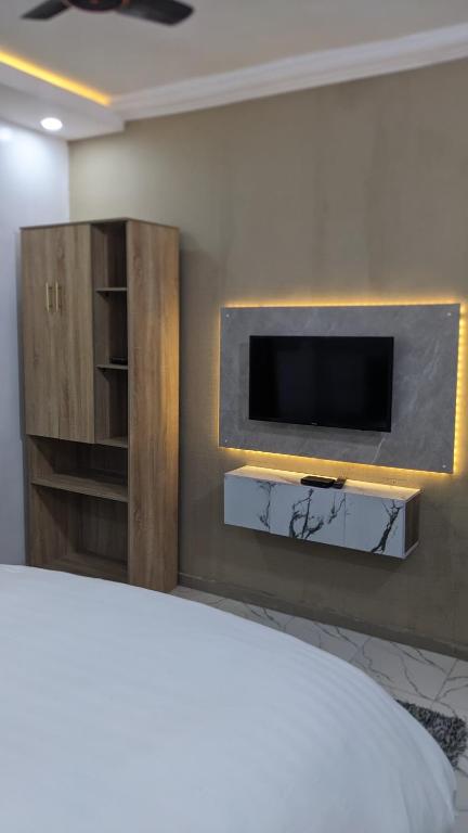 Postel nebo postele na pokoji v ubytování Nems Appartment
