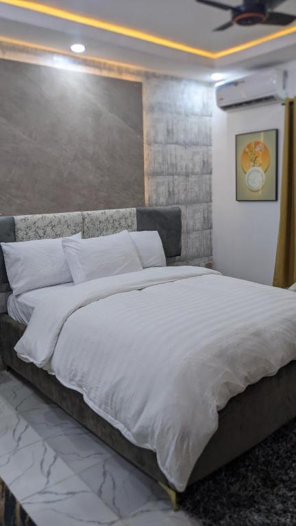Postel nebo postele na pokoji v ubytování Nems Appartment