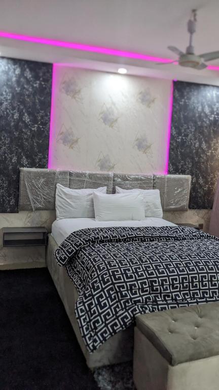 Postel nebo postele na pokoji v ubytování Nems Appartment