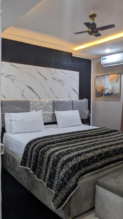 Postel nebo postele na pokoji v ubytování Nems Appartment