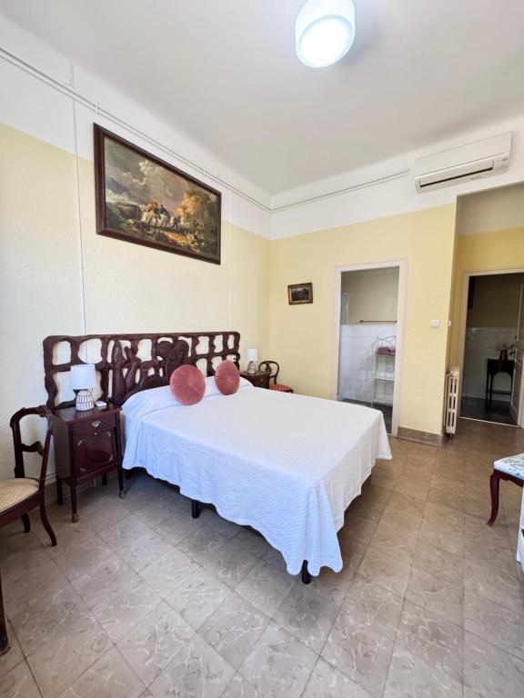 Posteľ alebo postele v izbe v ubytovaní Habitaciones Villa Marcia Solo Adulto