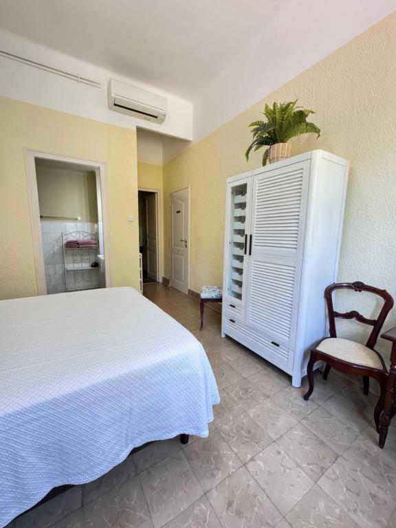 Posteľ alebo postele v izbe v ubytovaní Habitaciones Villa Marcia Solo Adulto