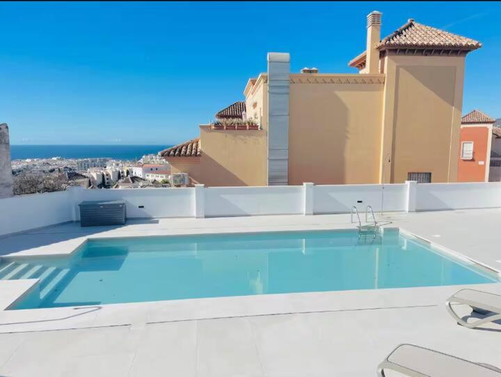 Terrace, Views, Pool and Garage Apartament in Nerja