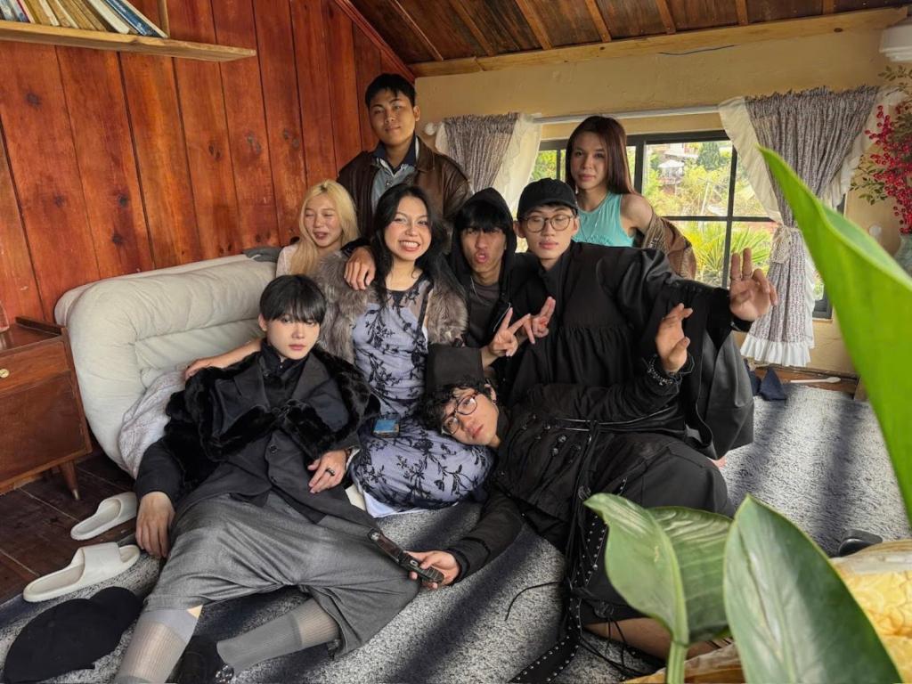 a group of people sitting on a couch at Hạ Hoàng Hôn House & Coffee in Da Lat