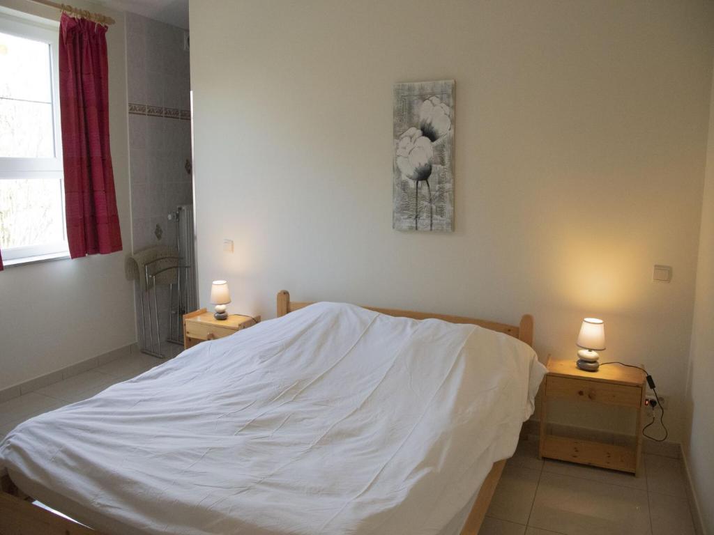 Postel nebo postele na pokoji v ubytování Contemporary Holiday Home in Houffalize with Private Garden