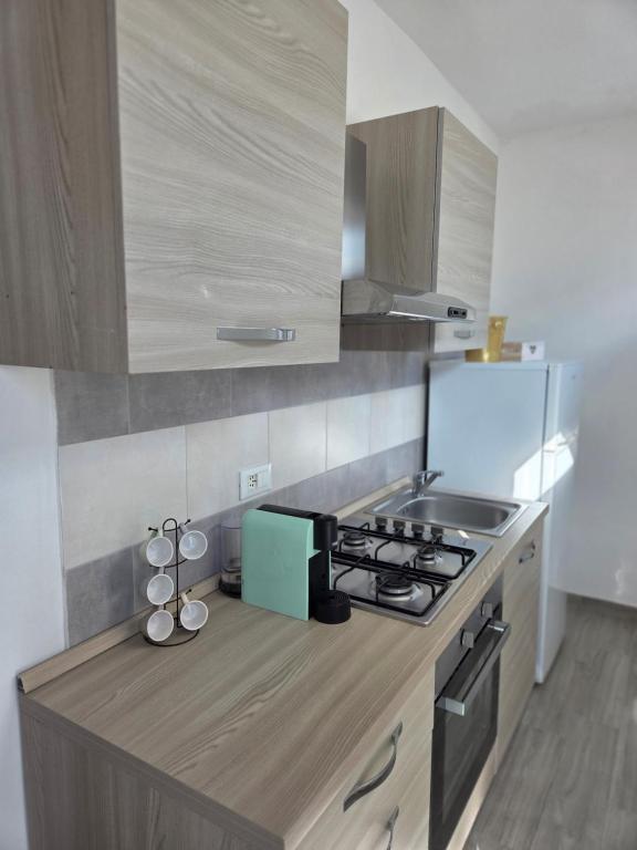 Kuchyň nebo kuchyňský kout v ubytování B&B Litoranea 80