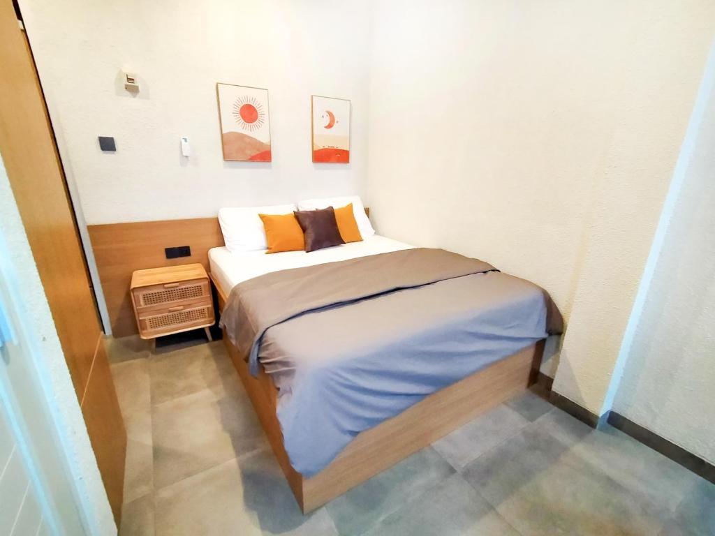Postel nebo postele na pokoji v ubytování Casa de Java Cirebon