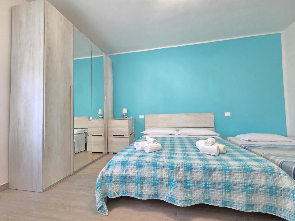 Postel nebo postele na pokoji v ubytování B&B Litoranea 80