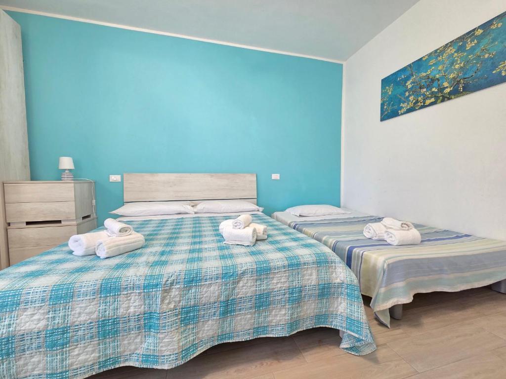 Postel nebo postele na pokoji v ubytování B&B Litoranea 80