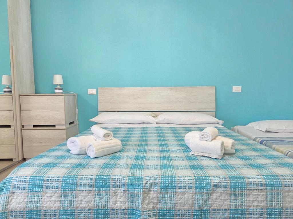 Postel nebo postele na pokoji v ubytování B&B Litoranea 80
