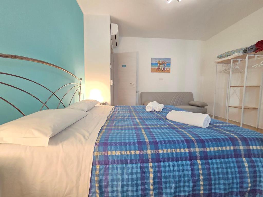 Postel nebo postele na pokoji v ubytování B&B Litoranea 80