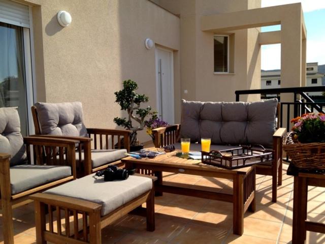 a living room with couches and a coffee table at Rainbow Home Coll Verd in Playa de Gandia