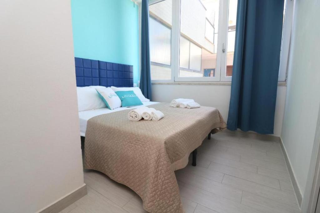 Postel nebo postele na pokoji v ubytování B&B Litoranea 80