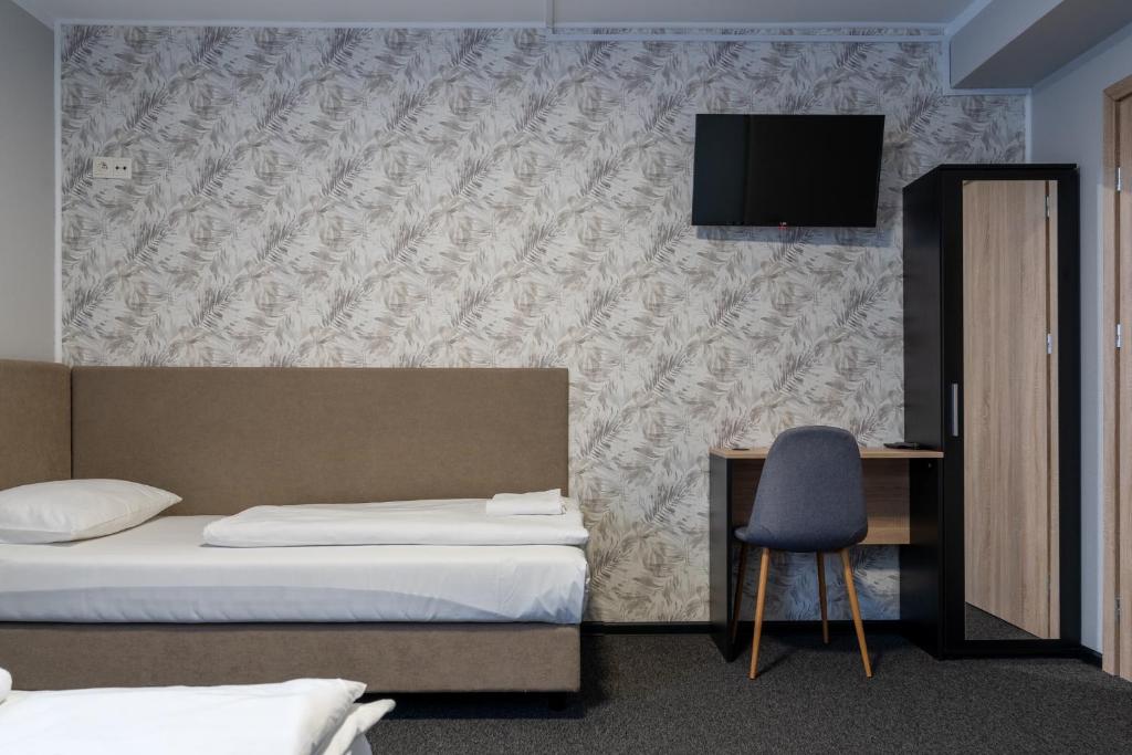Posteľ alebo postele v izbe v ubytovaní Noclegi Stop and Sleep Zgorzelec