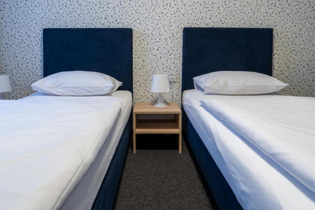 Posteľ alebo postele v izbe v ubytovaní Noclegi Stop and Sleep Zgorzelec