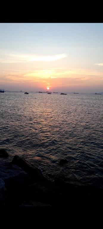 a sunset over a large body of water at Dscondo in Ban Map Chalut