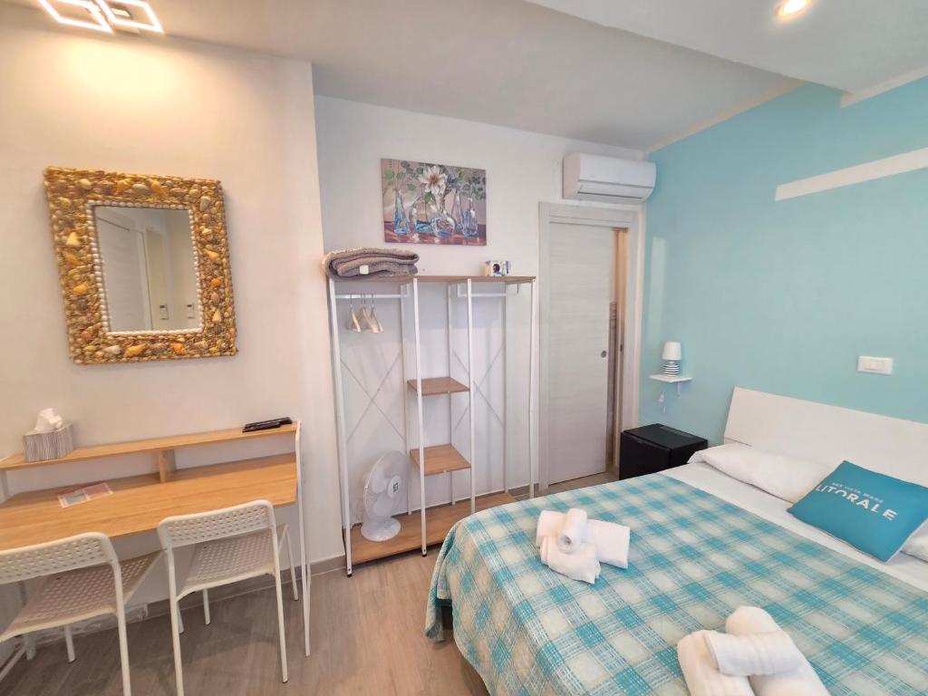 Postel nebo postele na pokoji v ubytování B&B Litoranea 80