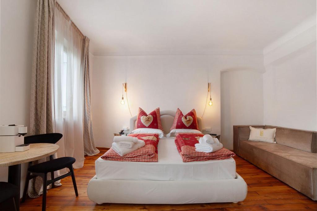 Postel nebo postele na pokoji v ubytování Boutique Hotel Santer Klause