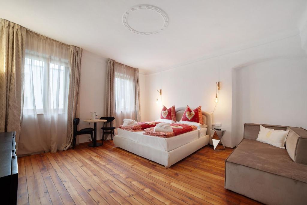 Postel nebo postele na pokoji v ubytování Boutique Hotel Santer Klause