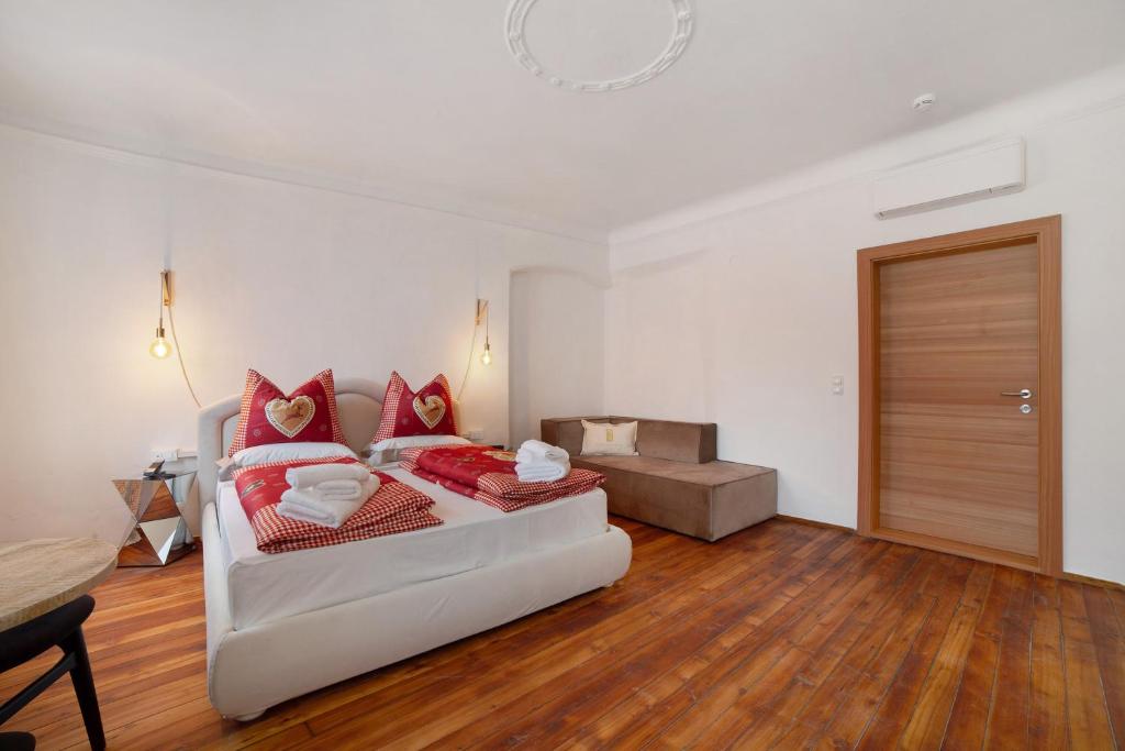 Postel nebo postele na pokoji v ubytování Boutique Hotel Santer Klause