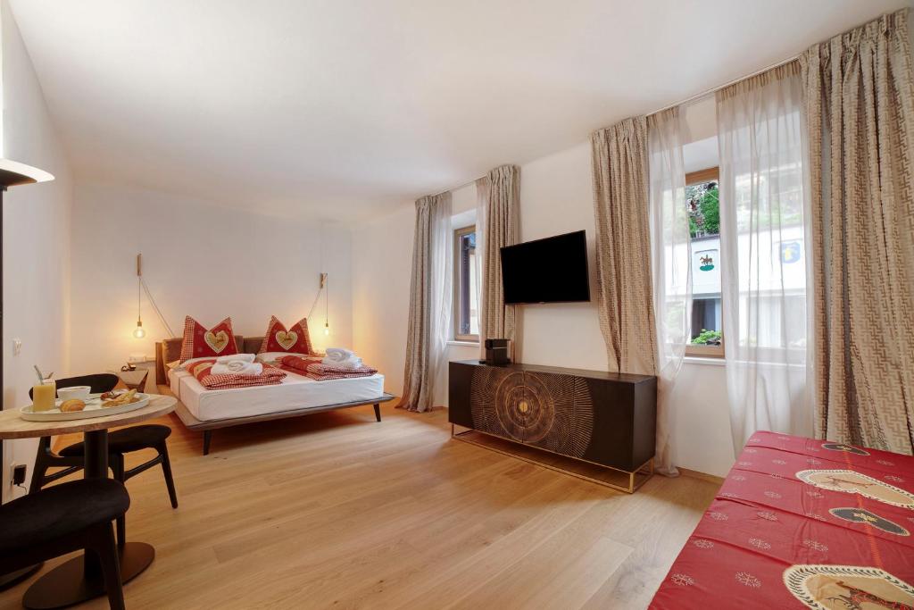 TV a/nebo společenská místnost v ubytování Boutique Hotel Santer Klause