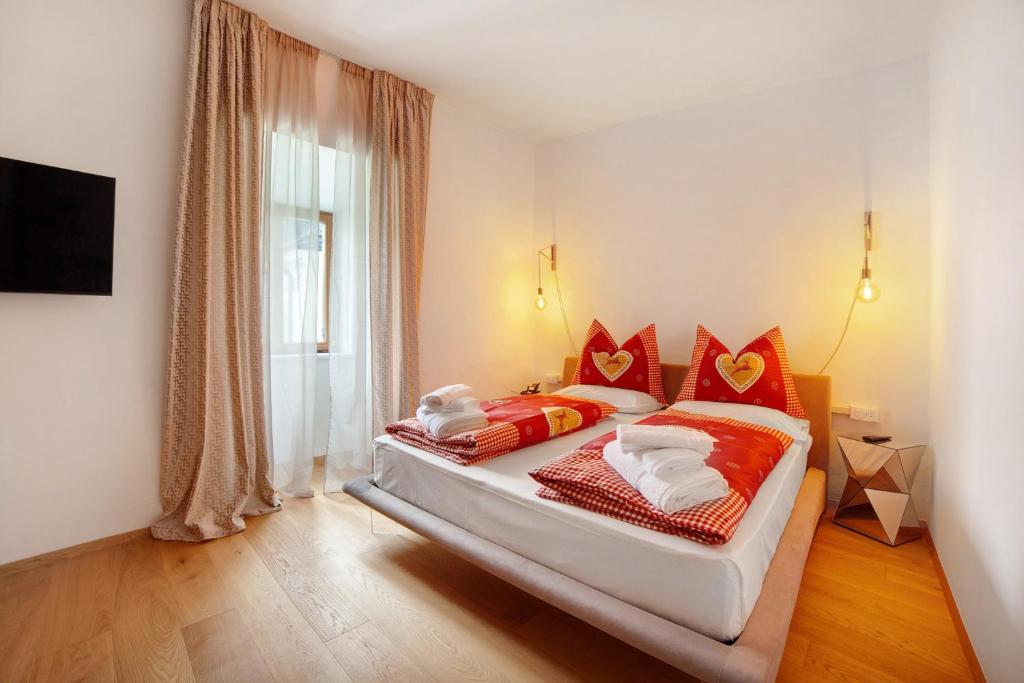 Postel nebo postele na pokoji v ubytování Boutique Hotel Santer Klause