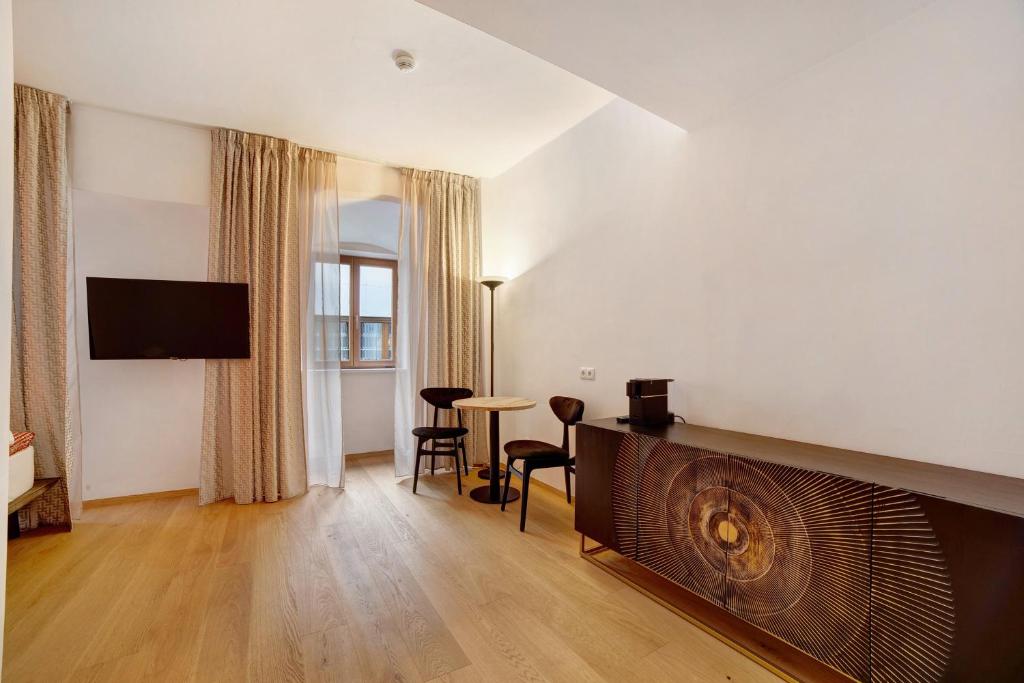 TV a/nebo společenská místnost v ubytování Boutique Hotel Santer Klause