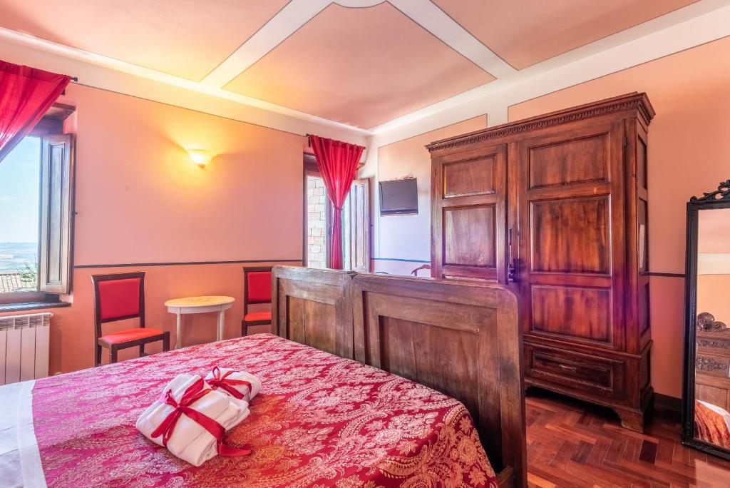 Postel nebo postele na pokoji v ubytování beb del Musico