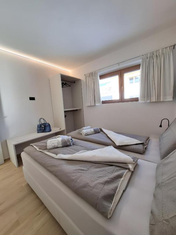 Postel nebo postele na pokoji v ubytování Chalet Ale Livigno