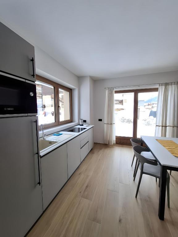Kuchyň nebo kuchyňský kout v ubytování Chalet Ale Livigno