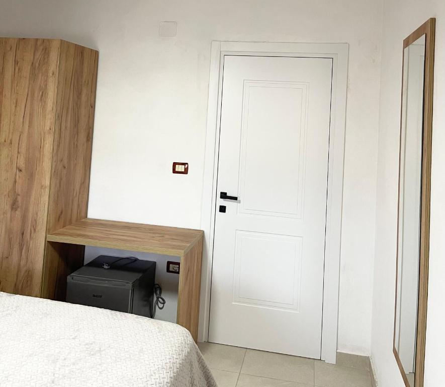 Postel nebo postele na pokoji v ubytování Prela's Rooms