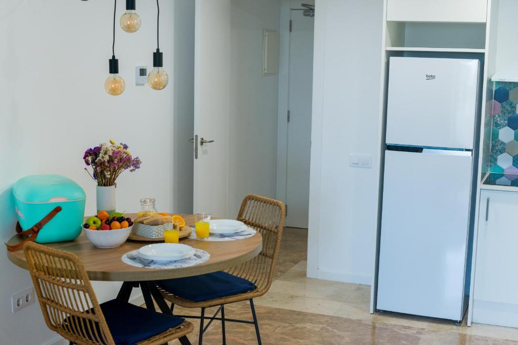 Kuchyň nebo kuchyňský kout v ubytování Bamblue Boutique Apartments