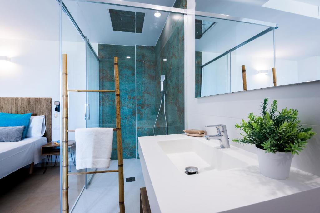 Postel nebo postele na pokoji v ubytování Bamblue Boutique Apartments
