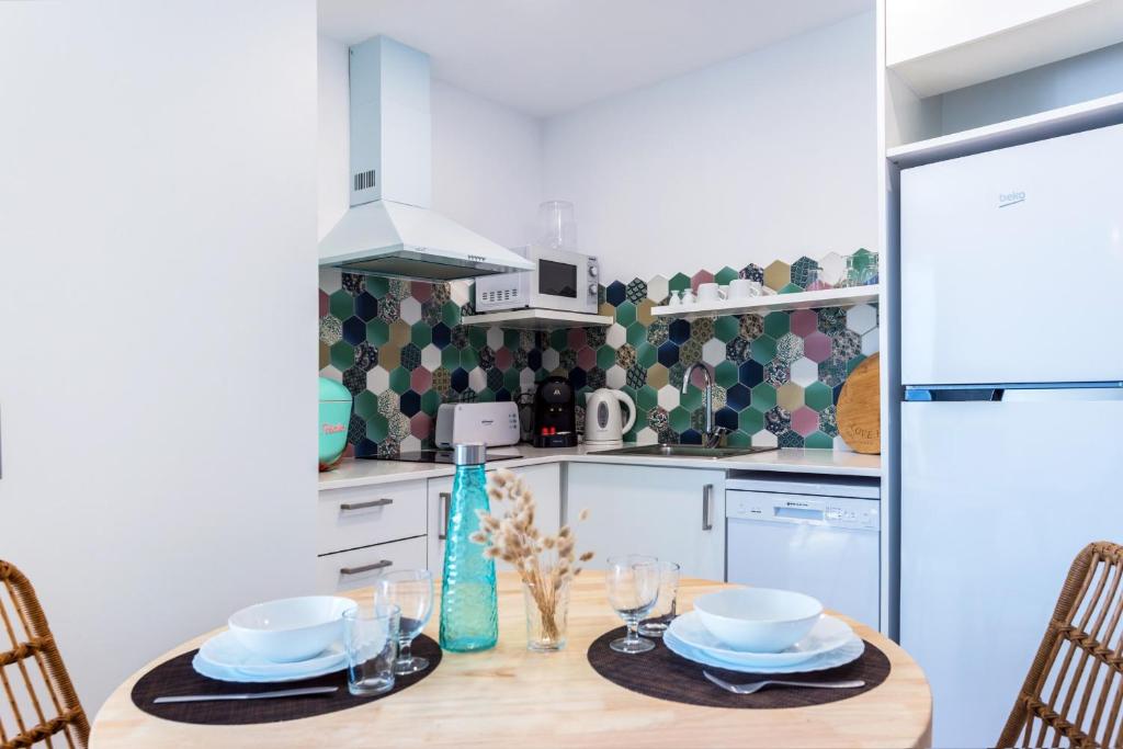 Kuchyň nebo kuchyňský kout v ubytování Bamblue Boutique Apartments