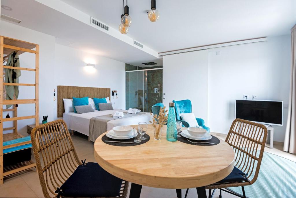 Postel nebo postele na pokoji v ubytování Bamblue Boutique Apartments