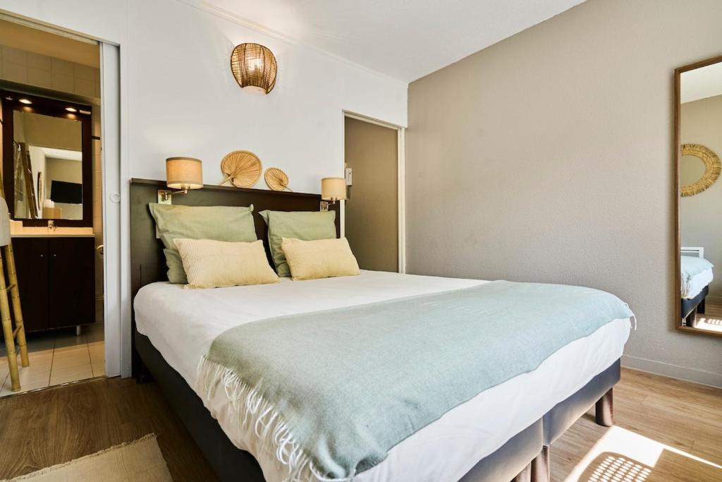 Ένα ή περισσότερα κρεβάτια σε δωμάτιο στο Charming studio, Vauban La Catho, Lille